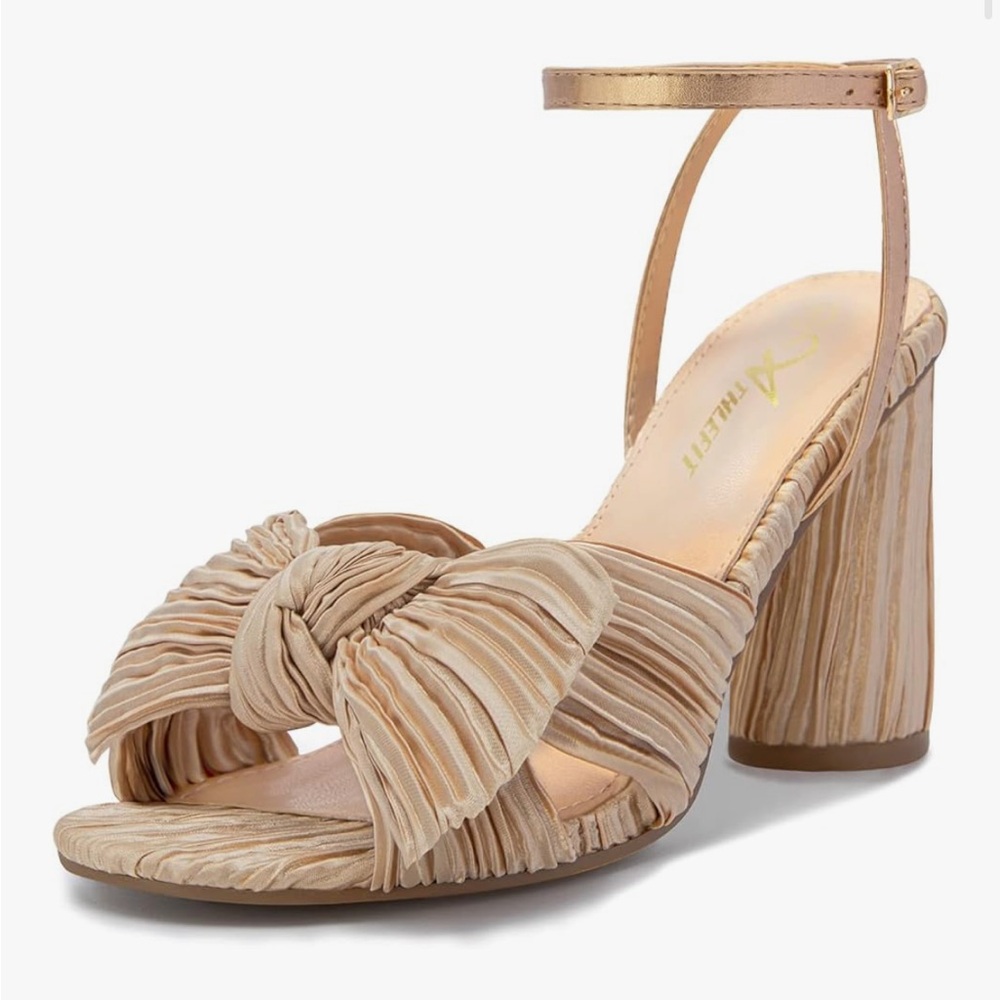 New gold bow heel with ankle strap